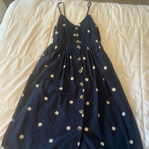 Tee length polka dot dress